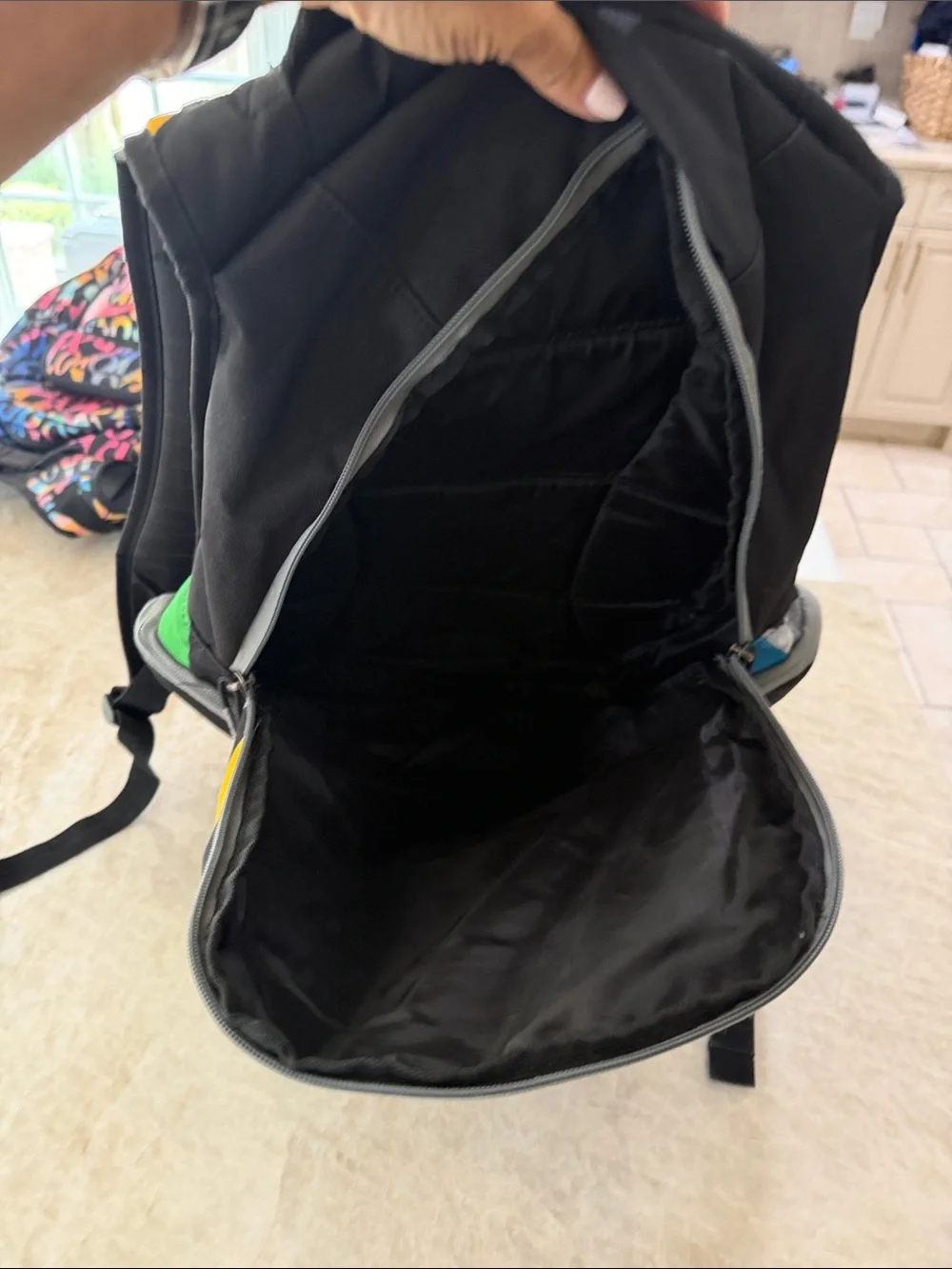 Quiksilver Black Backpack with Green, Blue incredible condition rarely worn